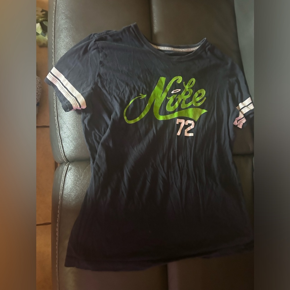 Blue, white and green Nike 72